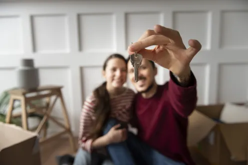 young couple moving into new home