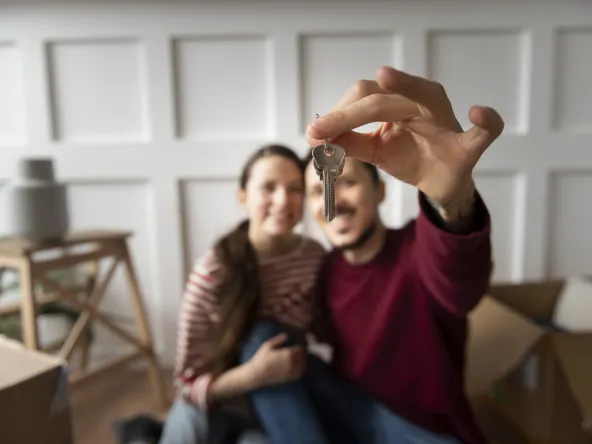 young couple moving into new home